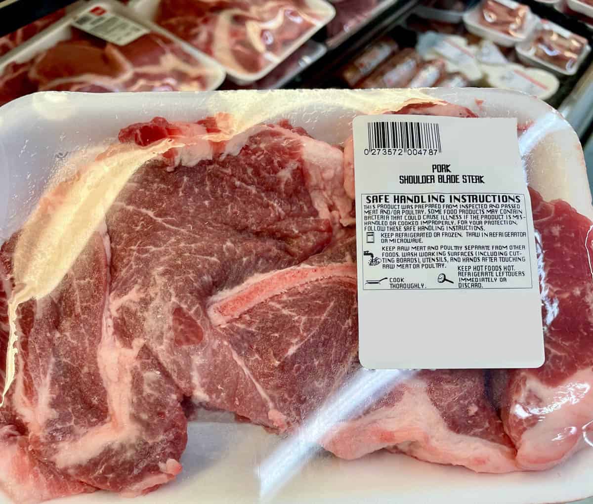 package of pork shoulder blade steak found in meat aisle