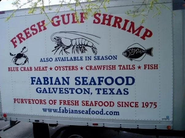 fabian fresh gulf shrimp banner on side of refrigerated truck