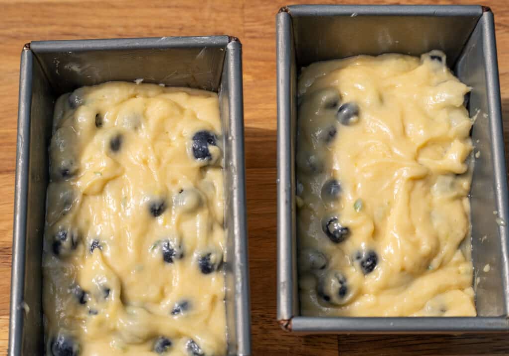 Blueberry lemon yogurt cake batter in mini loaf pans