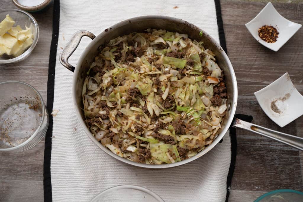 runza filling of ground beef, onion and cabbage in a skillet