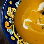 Butternut Squash Soup For Two in a Sicilian Soup Bowl garnished with cream and pepitas