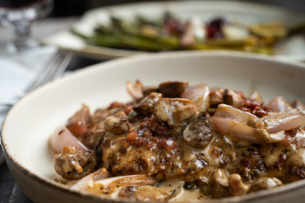 Chicken Marsala For Two plated with Asparagus
