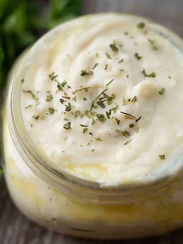 small batch of homemade condensed cream of chicken soup in a mason jar