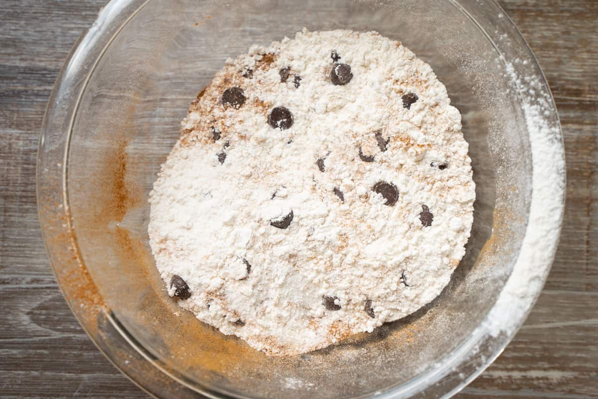Dry ingredients for banana bread sifted into a glass bowl