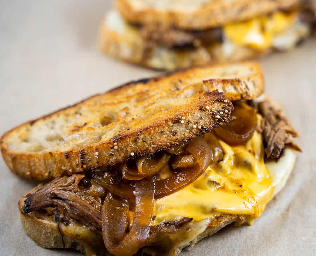 Brisket grilled cheese on parchment paper