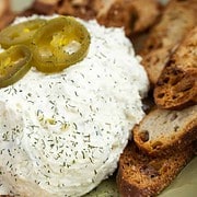 cheese ball surrounded with crostini
