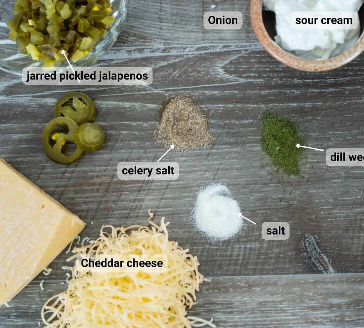 Cheese ball jalapeno ingredients on a wooden table