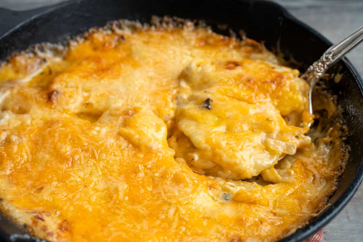 scalloped potatoes for two in a cast iron skillet