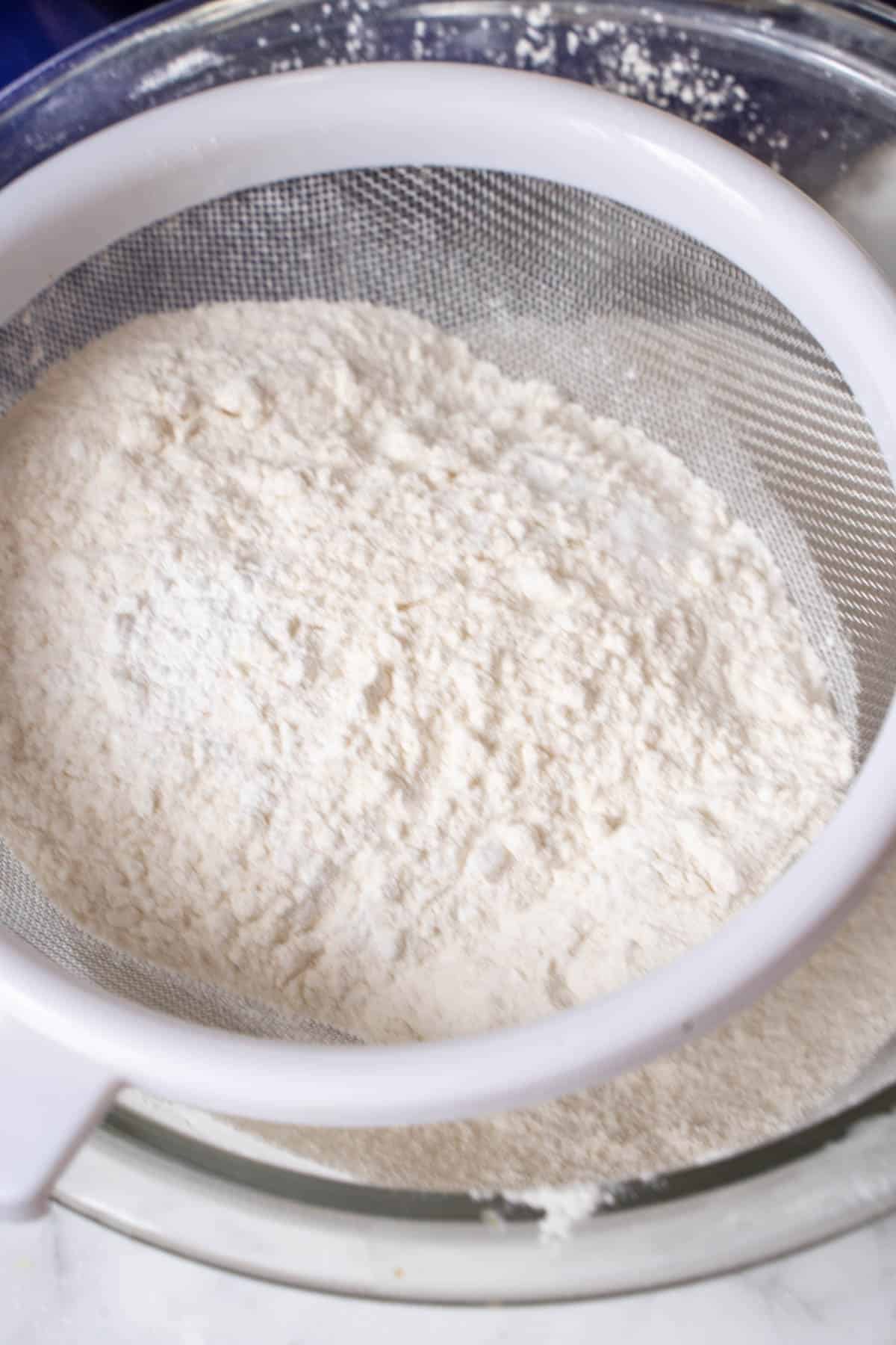flour in a fine sieve