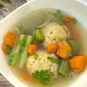 Matzo ball soup recipe in a white bowl