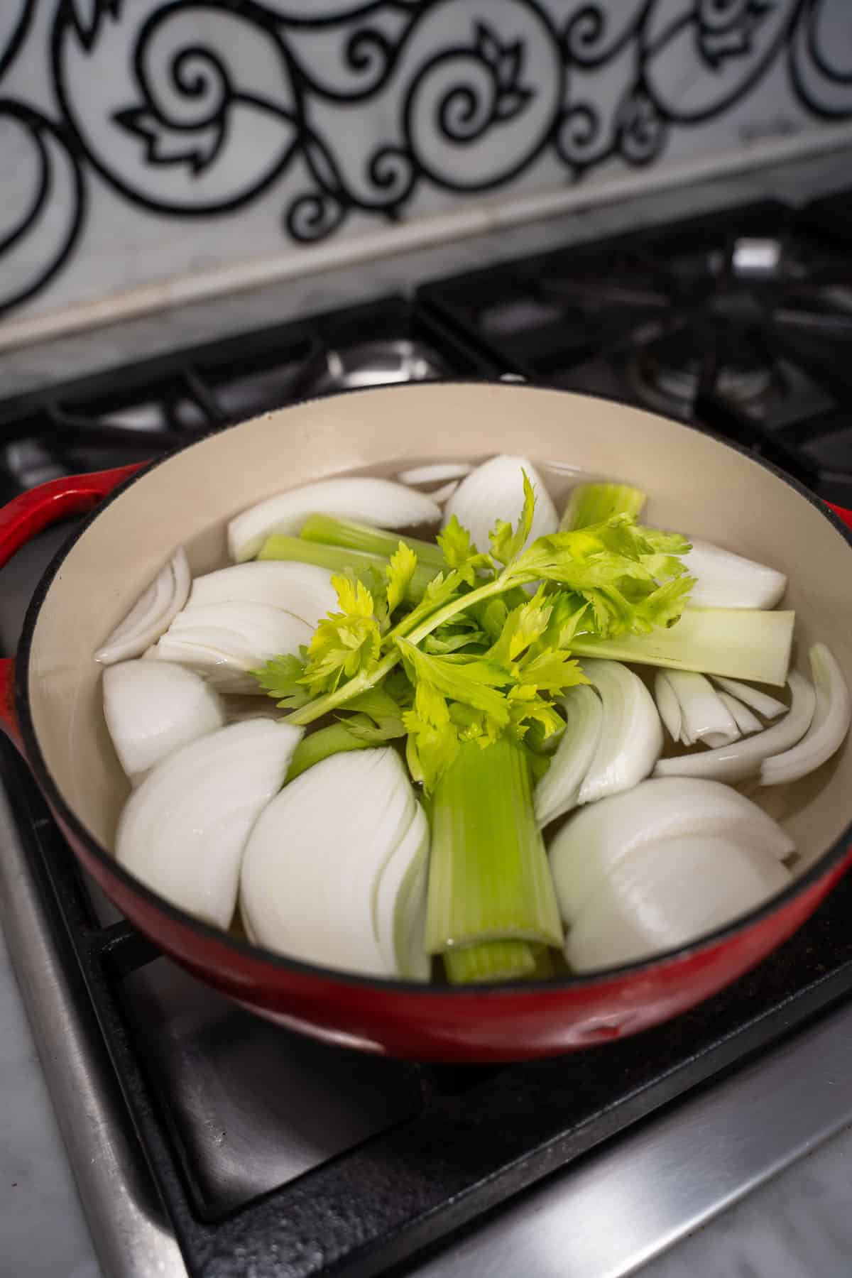 Onions and celery in a stock pot