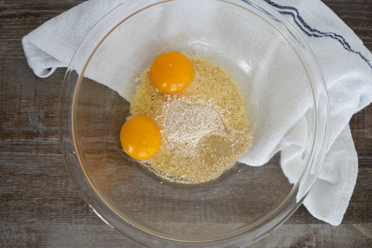 egg, matzo meal and vegetable oil in a glass bowl