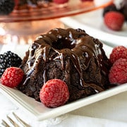 mini chocolate bundt cake on a white square plate
