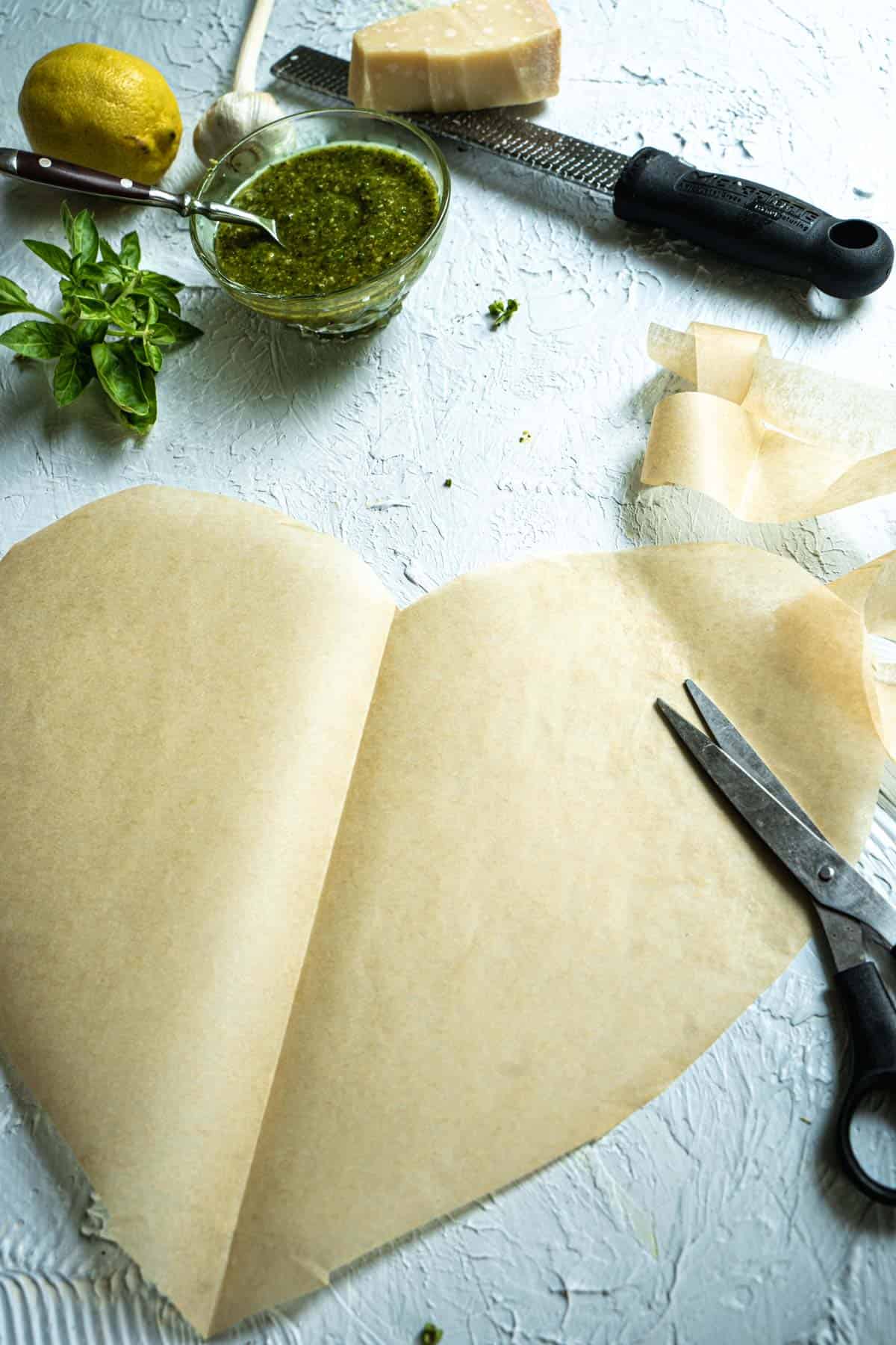 how to bake chicken breasts using an unfolded heart shaped parchment paper