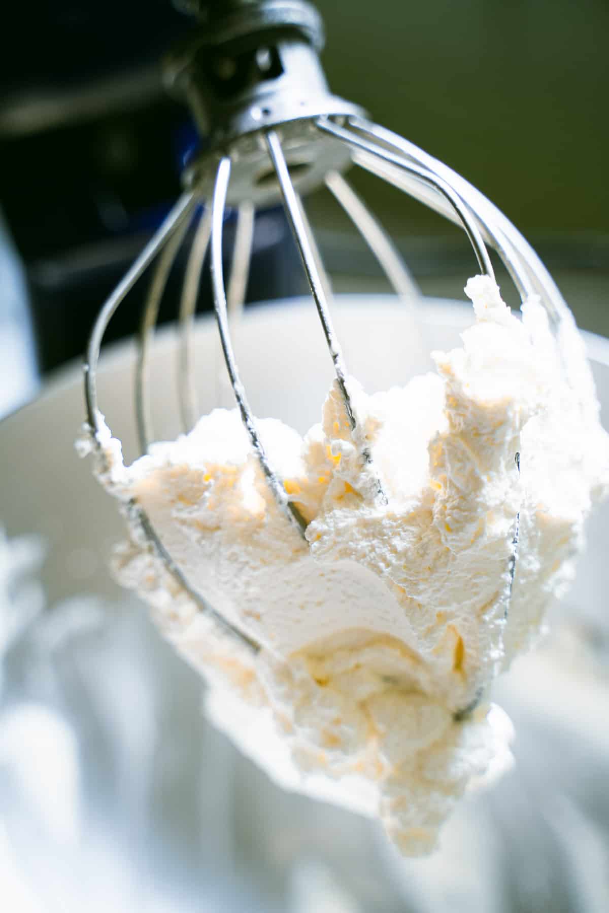 whipped cream on a stand mixer whisk attachment