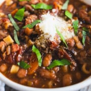Authentic pasta fagioli with pancetta recipe in a white serving bowl.