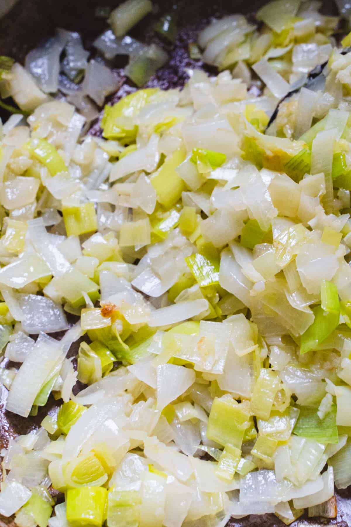 chopped leeks, onions, ginger and garlic in a dutch oven.