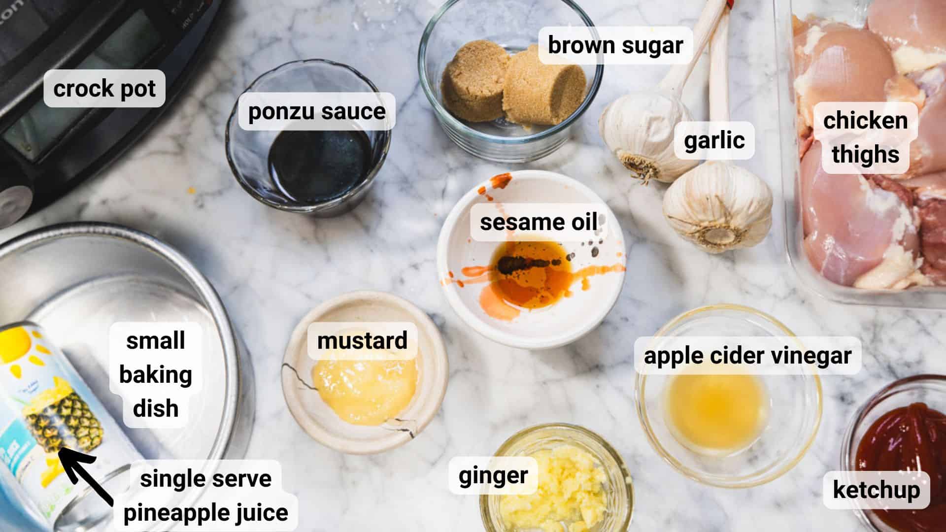 Ingredients and equipment to make crock pot huli huli chicken on a white marble counter.