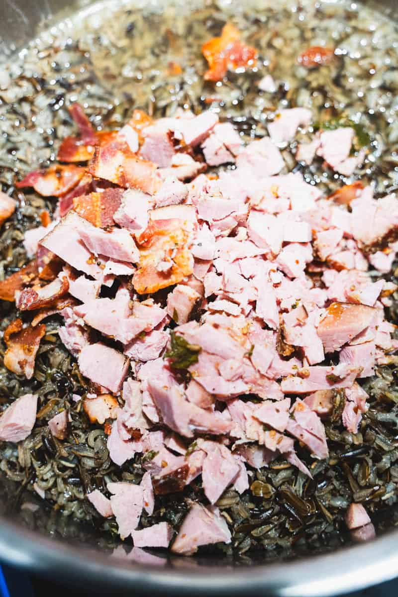 ham and wild rice in a soup pot to make cream of mushroom wild rice soup.