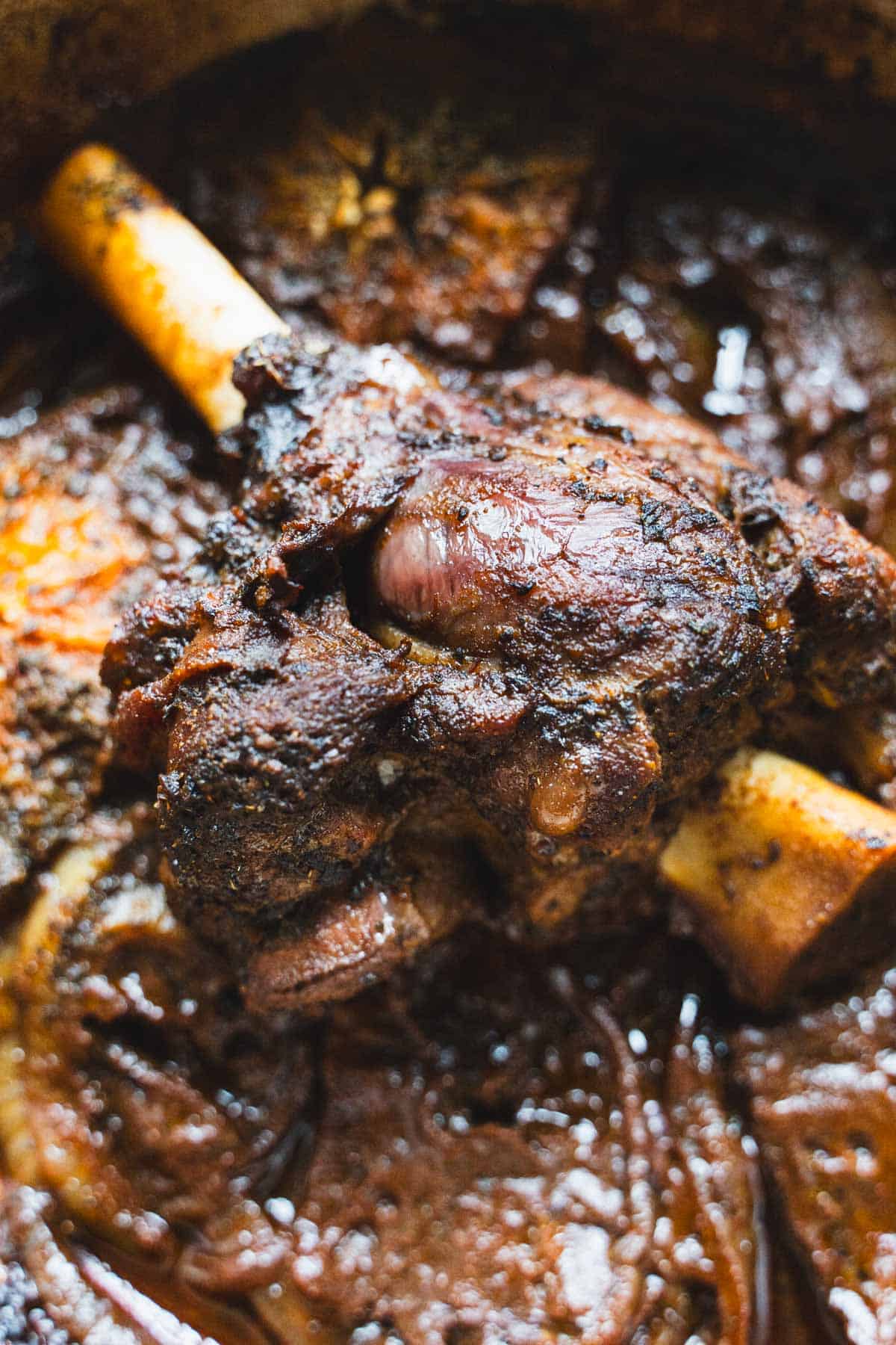 Lamb shank slow roasted after 2 hours in a dutch oven.