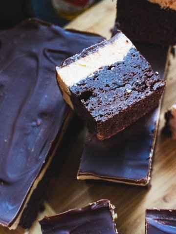 Bourbon Biscoff Cookie Butter Chocolate brownies laying on side to show three layers