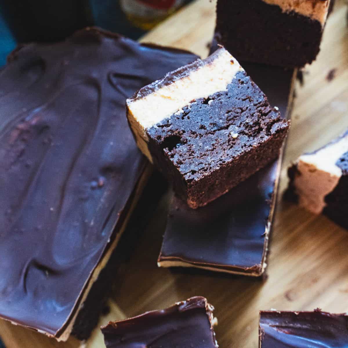 Bourbon Biscoff Cookie Butter Chocolate brownies laying on side to show three layers