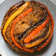 Carrot upside down cake on a blue plate.